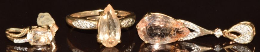 A 9ct gold ring and pendant both set with a pear cut Imperial beryl and diamonds, and a single