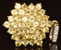 A 9k gold pendant set with thirty-seven round cut sphene and three diamonds, with certificate, 3.5g