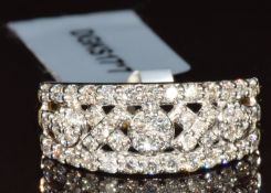 A 9k gold ring set with fifty round cut diamonds from the Argyle mine, total diamond weight 0.