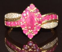 A 9ct gold ring set with rubies and diamonds in a marquise setting, size P, 3.5g