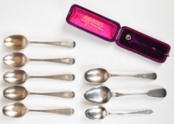 Eight hallmarked silver spoons to include a set of six, London 1893, maker Josiah Williams & Co