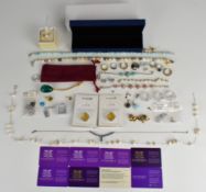 A collection of jewellery, some silver including a necklace set with tanzanites, necklace set with