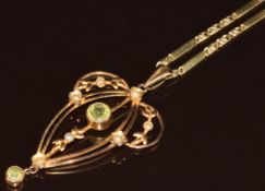 Edwardian 9ct gold pendant set with two round cut peridots and split pearls, on 9ct gold chain, 9.
