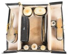 George V hallmarked silver gilt mounted dressing table set including five silver topped cut glass