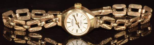 Roamer 9ct gold ladies wristwatch with gold hands and baton hour markers, white dial and 18 jewel