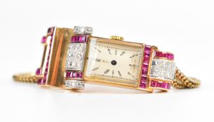 Art Deco 18ct gold ladies wristwatch set with calibre cut rubies and diamonds to the case, black