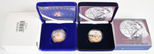 Two Royal Mint silver proof £5 coins comprising 2000 Millennium and 2001 Victorian Anniversary