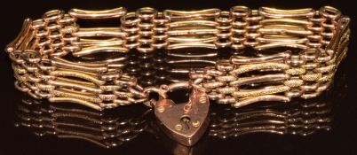 A 9ct rose gold gate bracelet with heart padlock clasp, 17.7g, 20cm