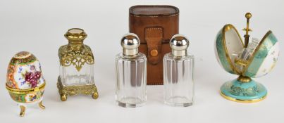 Four scent / perfume bottles or etui including egg shaped example with push opening mechanism,