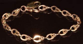 A 9ct gold bracelet made up of oval links with rope twist decoration, 16.2g, 20cm