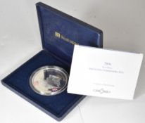 Cased 2004 Britannia commemorative 5oz .999 silver coin to mark the handover of the transatlantic