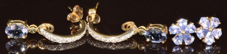Two pairs of 9k gold earrings, one pair set with tanzanites in a cluster and the other tanzanites