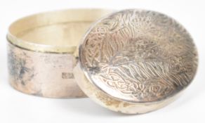 Liberty & Co modern hallmarked silver oval covered pill box with Arts & Crafts style decoration,