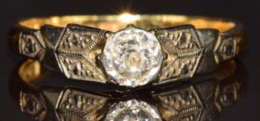 An 18ct gold ring set with an old cut diamond in a platinum setting, 2.3g, size K/L