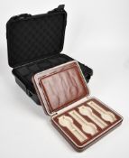 Two wristwatch cases, one Peli style with cushioned interior for 15 watches (36 x 30 x 12cm), the