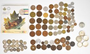 Small collection of base metal and silver world coins, mostly 20th century, including three