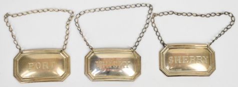 Set of three modern hallmarked silver bottle tickets comprising Sherry, Whisky and Port, London