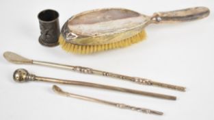 Hallmarked silver backed brush, three bombilla straws and a small silver pot marked Siam Sterling to