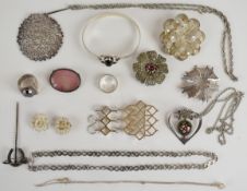 A collection of silver jewellery including French Art Deco clip set with paste, bangle set with