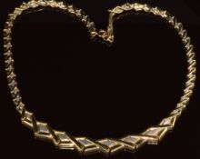 A 9ct gold bi-coloured necklace made up of fancy links, 12.6g, 40cm