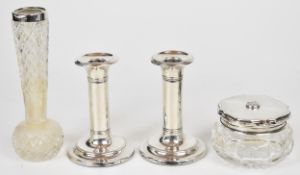 Pair of Edward VII hallmarked silver candlesticks, Birmingham 1907, maker Ellis & Co, height 11cm,