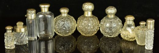 Ten hallmarked silver and cut glass scent / perfume bottles, tallest 9cm