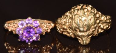 A 9ct gold ring in the form of a lion and a 9ct gold ring set with amethysts, 8.1g, size S & N