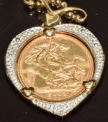 A 9ct gold pendant set with a 2003 gold half sovereign, on 9ct gold chain, 10.2g