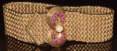 A 9ct gold bracelet made up of diagonal weaved links, the clasp set with rubies and a cultured