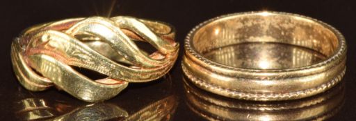 A 14k gold ring (2.3g, size L) and a 9ct gold ring (2.4g, size L)
