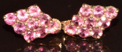 A pair of 9k gold earrings set with eighteen round cut Morro Redondo pink tourmalines, with