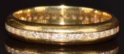 An 18ct gold ring full eternity ring set with diamonds, 3.5g, size M