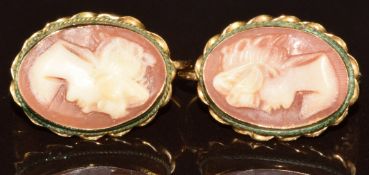 A pair of 18k gold earrings each set with a cameo depicting a young woman, 3.2g