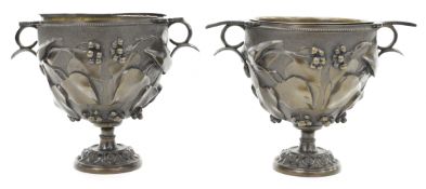Pair of 19th/20thC continental bronze urns with grape and vine decoration in relief, diameter 11,
