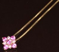 A 14k gold pendant set with cubic zirconia (1.3g), on 9ct gold chain (3.5g, 40cm)