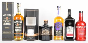 Five bottles of single malt and blended Irish Whiskey comprising The Sexton, The Pogues, Slane, Thin