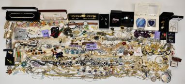 A collection of jewellery including earrings, silver and marcasite ring, brooches including Sphinx