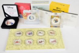 Two boxed Royal Mint 2018 silver proof coins The Snowman and Paddington, Disney 'Koin Club' 2oz pure