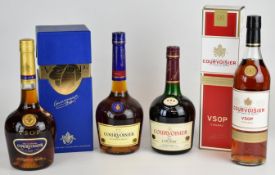Four bottles of Courvoisier Cognac, all 40% vol and 70cl, two in presentation boxes. PLEASE NOTE ALL