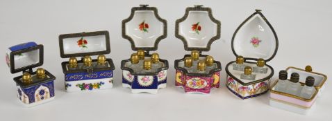 Six porcelain scent / perfume bottle etui with hinged lids, tallest 7cm