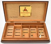 Mahogany or similar compartmented cigar humidor with Montecristo nameplate to interior, 45cm x