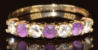 A 9ct gold ring set with amethysts and cubic zirconia, 1.5g, size L
