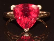 An 18k rose gold ring set with a trilliant cut cruzeiro rubellite of approximately 4.5ct, by Tomas
