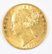 1869 Queen Victoria gold full sovereign with young head and shield reverse, die number 7, VF