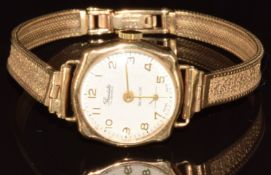 Precista 9ct gold ladies wristwatch with subsidiary seconds dial, gold hands and Arabic numerals,