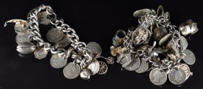 Two silver charm bracelets with over thirty charms including dog, penguin, Rugby ball, St