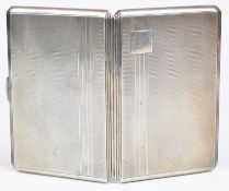 Art Deco hallmarked silver cigarette case with engine turned decoration and gilt interior,