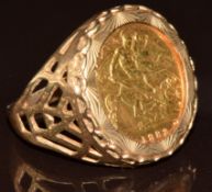 A 9ct gold ring set with a 1982 half sovereign, 8g, size Q