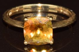 A 9k gold ring set with an antique cushion cut sphene, with certificate, 2.4g, size N