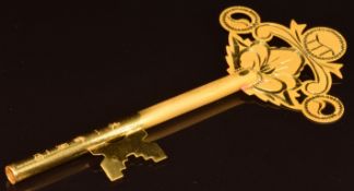 A 24ct gold key, 18.9g, 11.6cm
